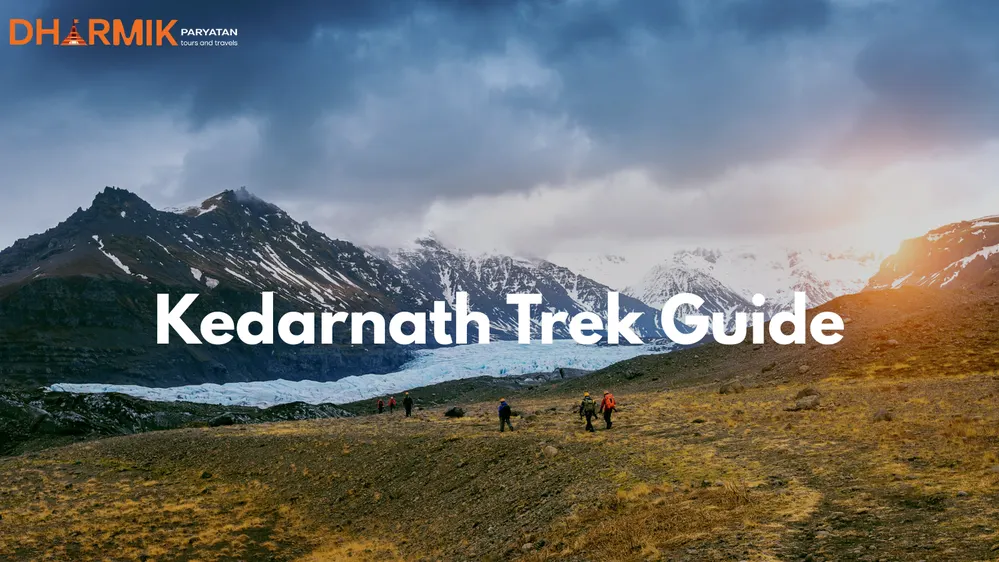 Trekkers walking towards snow-covered mountains under a dramatic sky — Kedarnath Trek Guide 2025